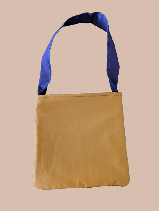 Colorful bag with a blue strap 